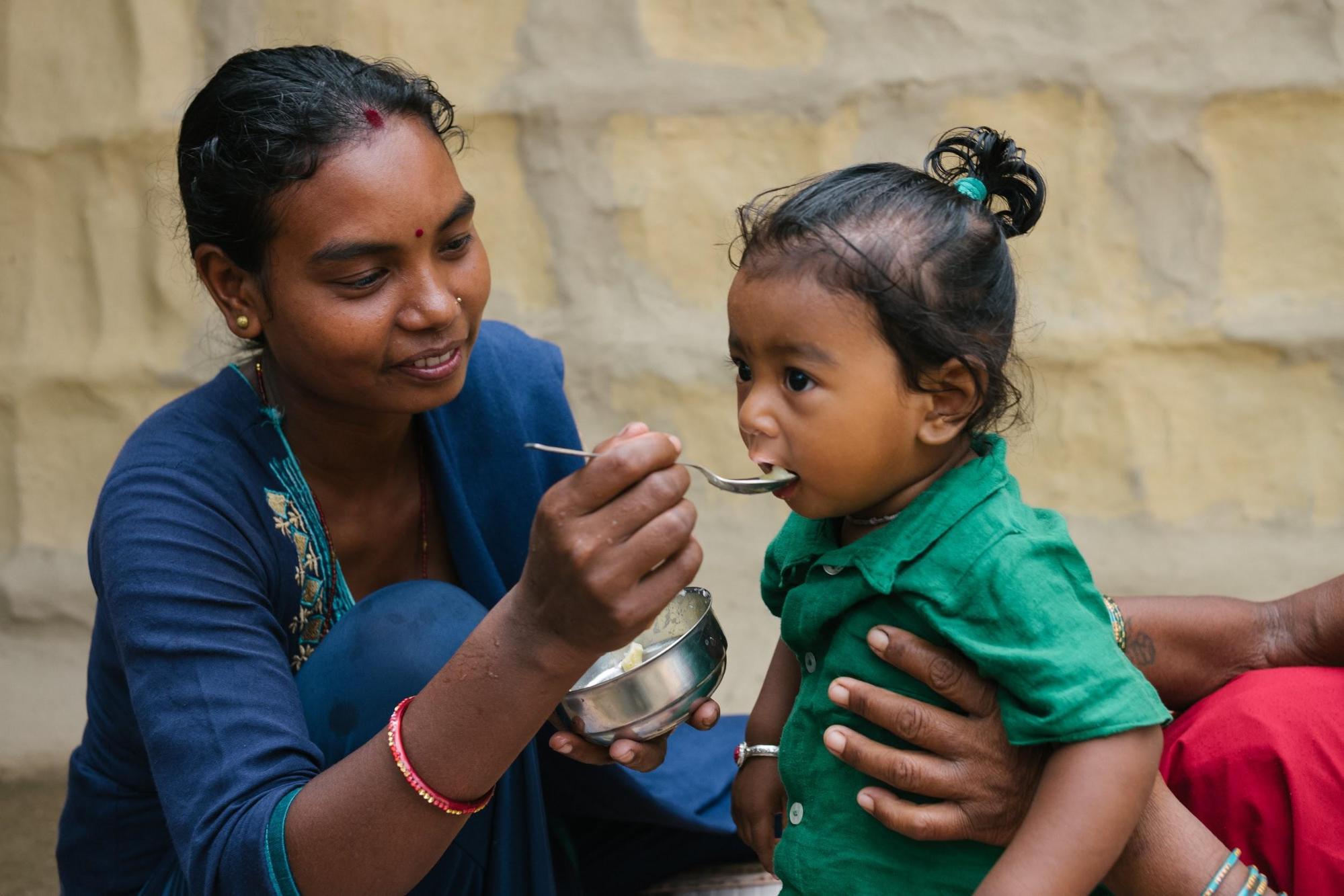 USAID is committed to supporting country-owned, country-led interventions to reduce the prevalence of malnutrition, such as counseling on infant and young child feeding practices. Photo: Dave Cooper for USAID